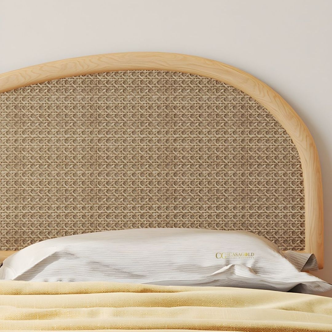 Handcrafted bed with wavy rattan headboard and wood base