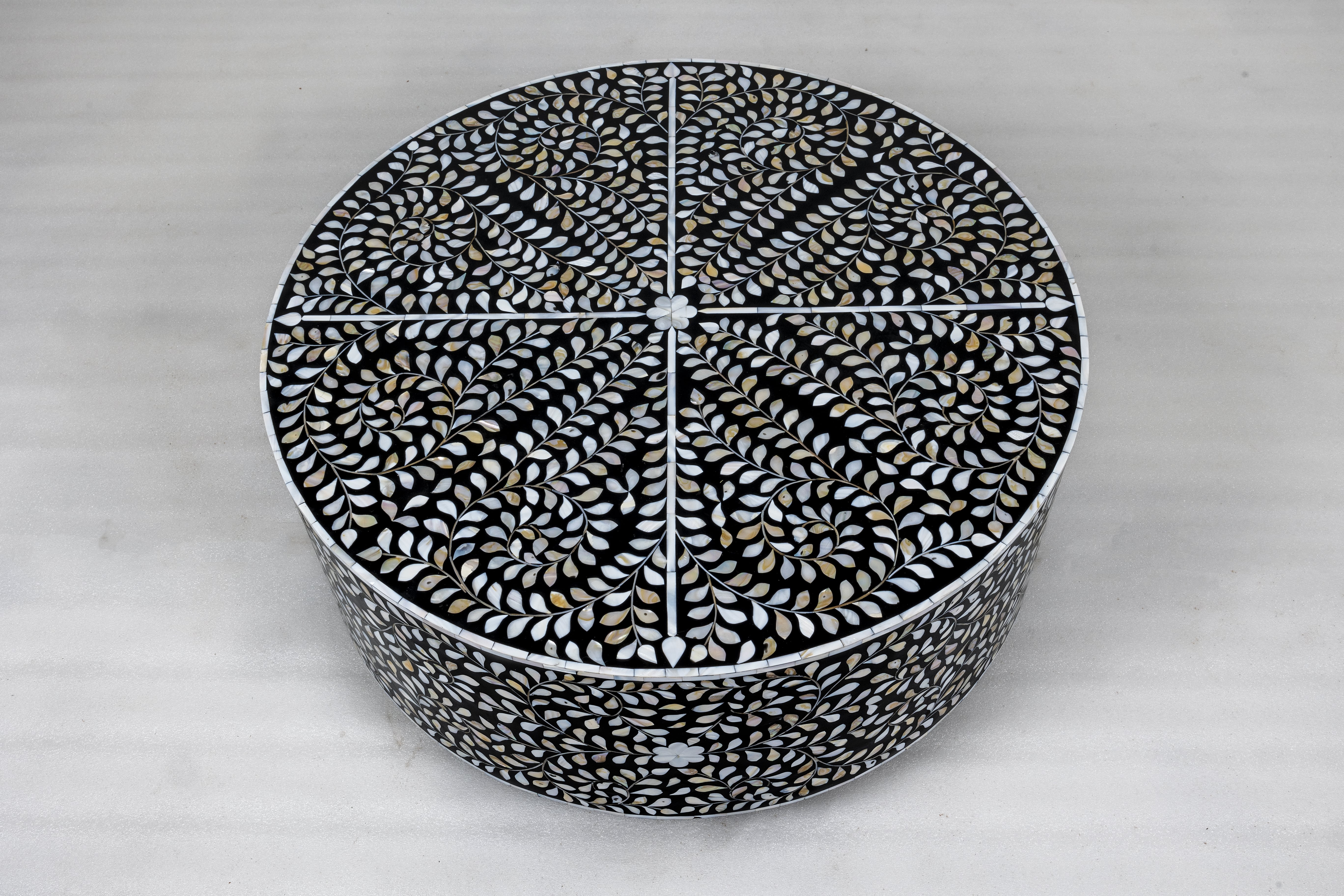 Intricate round bone inlay coffee table
