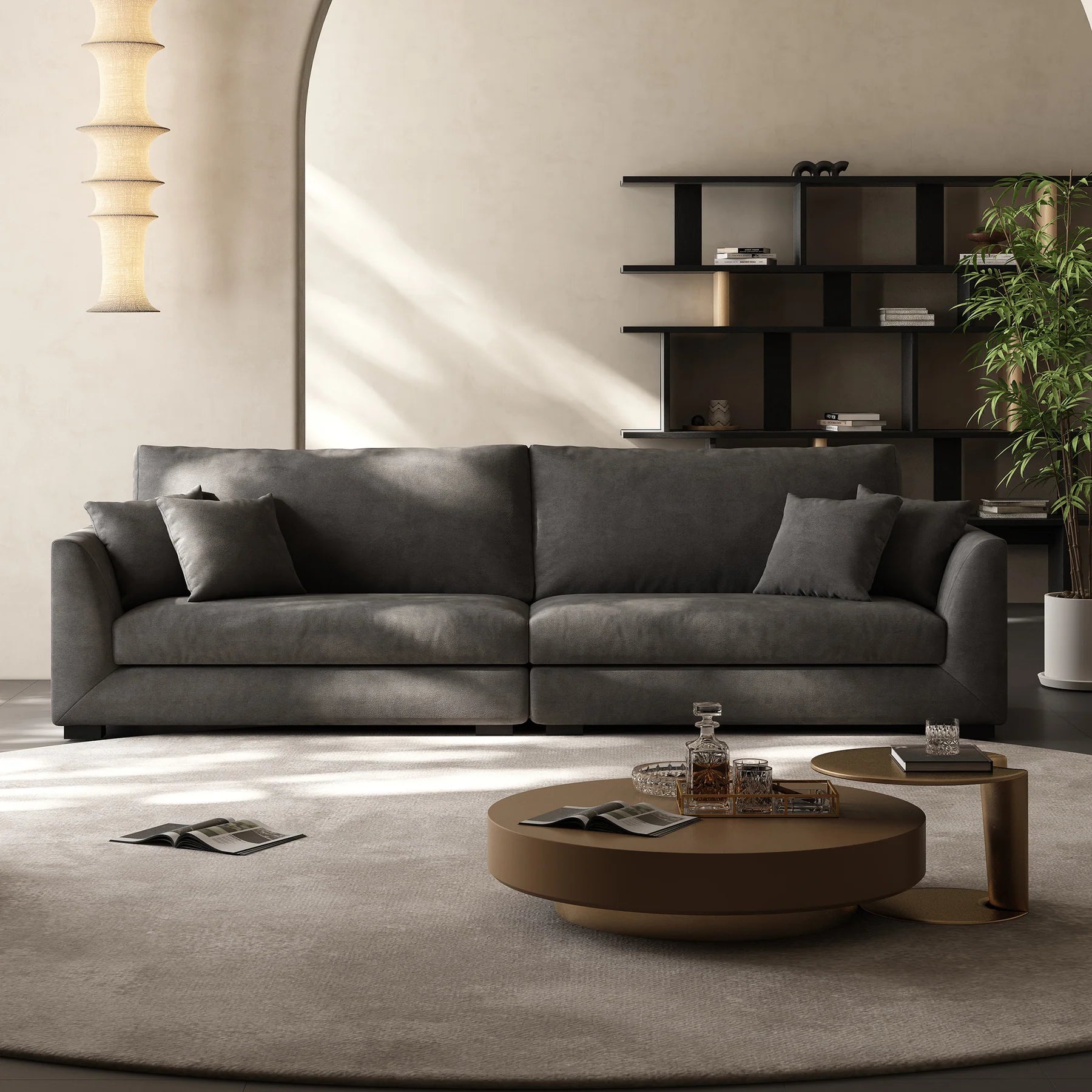Modern charcoal three-seater sofa with deep plush cushions and metal legs, customizable to two-seater.