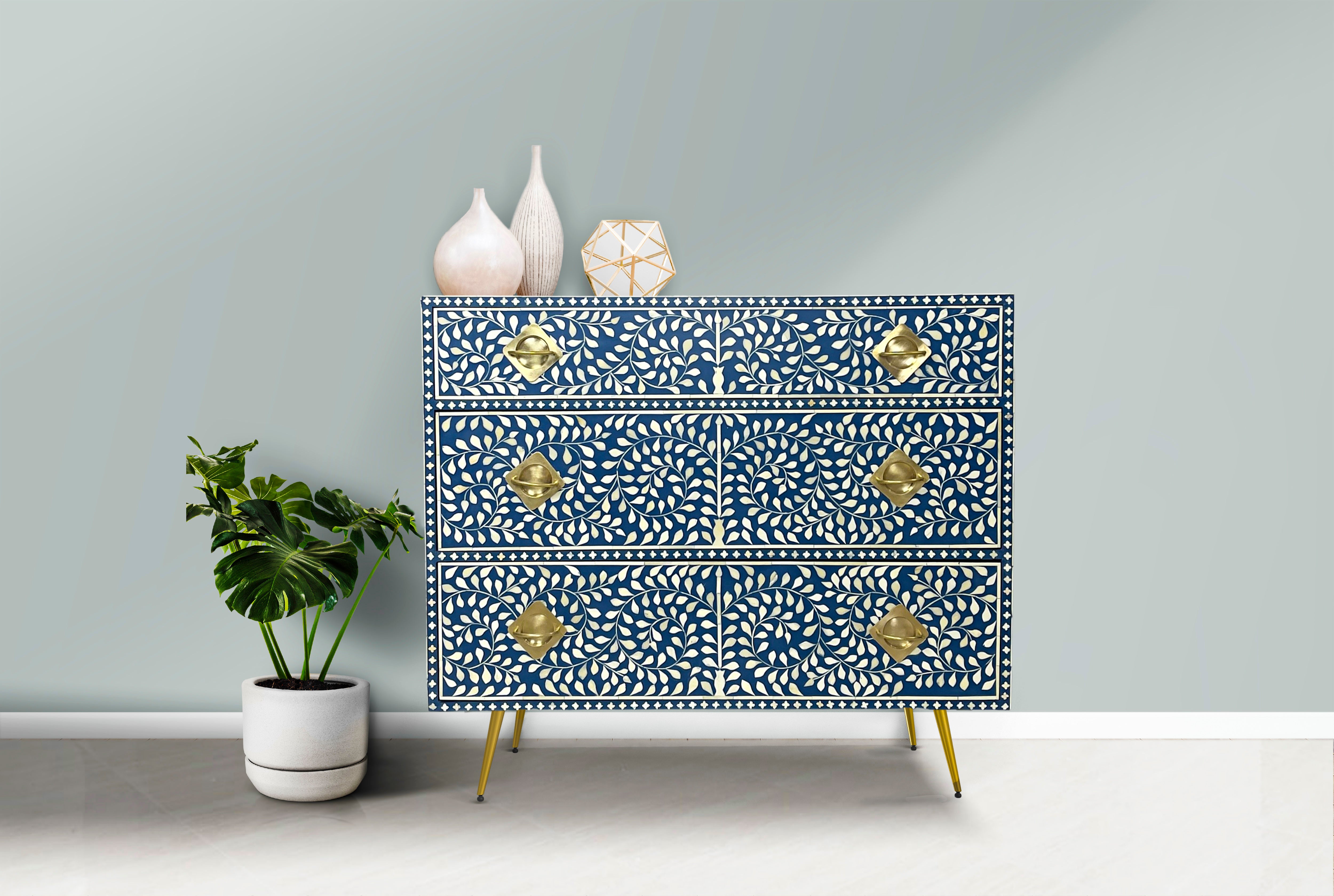 Luxurious mother of pearl inlay chest with intricate patterns
