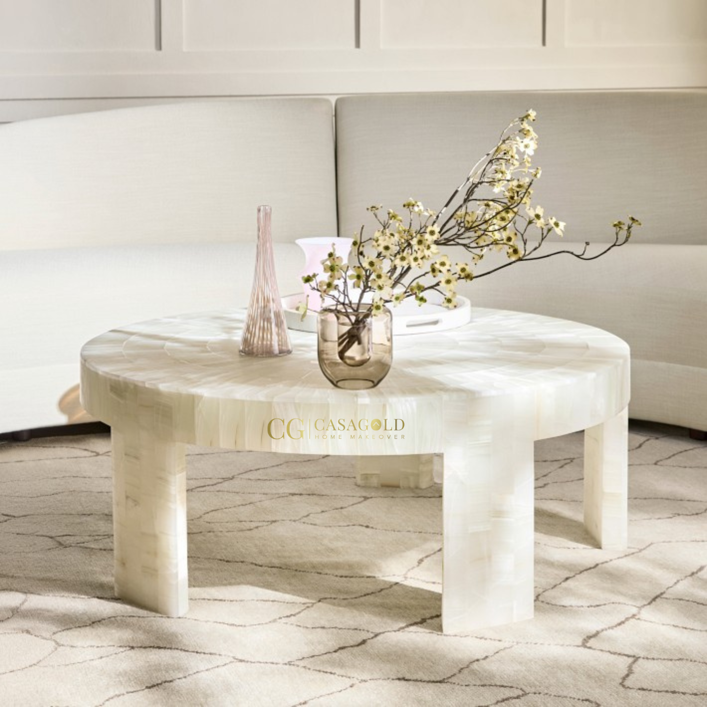 Minimalist white coffee table styled with neutral décor