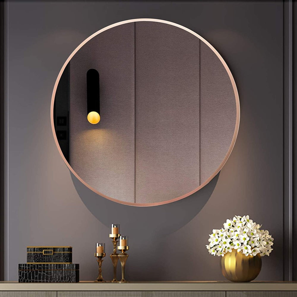 Minimalist Rosegold finish round steel frame glass mirror for chic interiors
