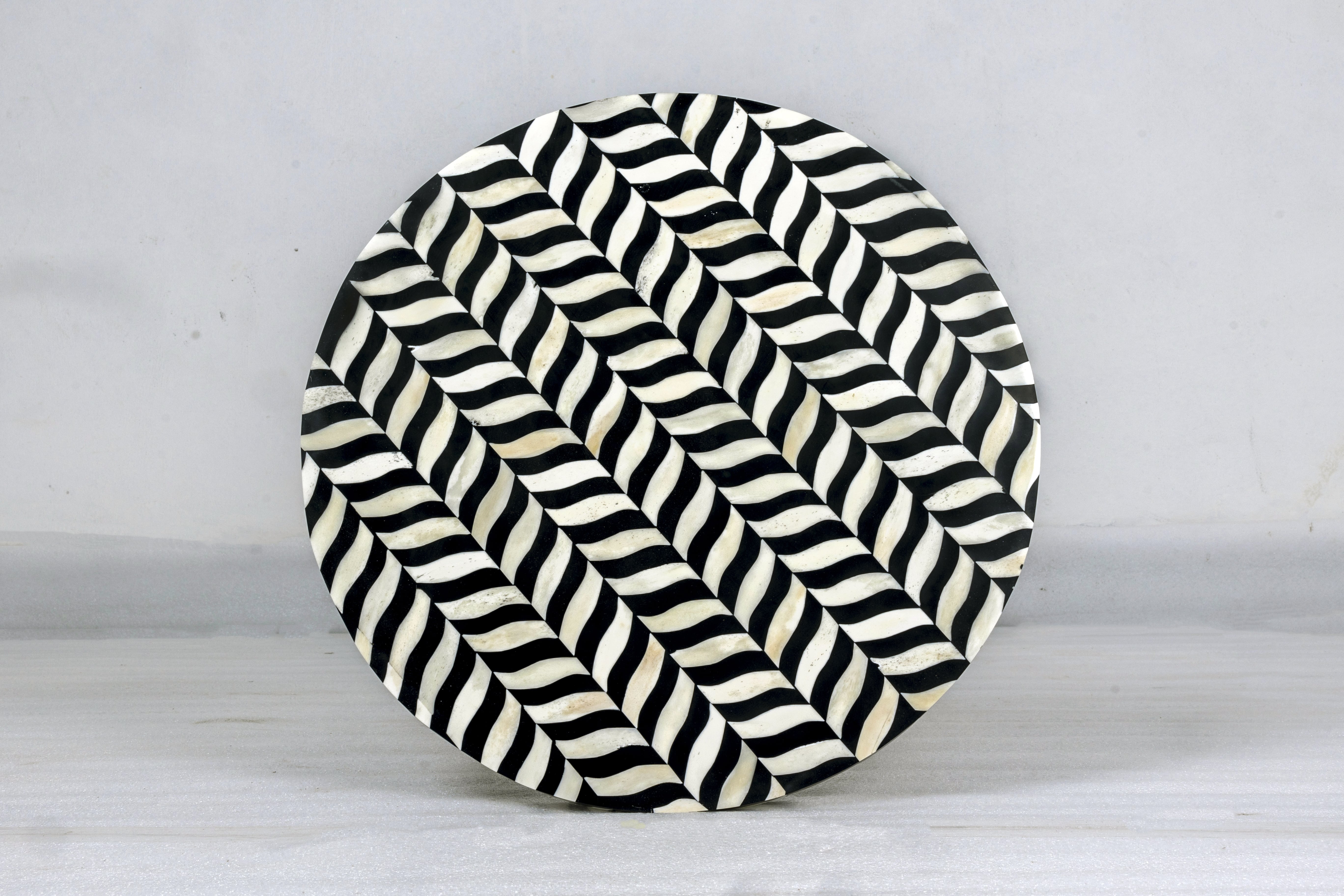 "Minimalist round inlay side table with 3 simple and functional legs"
