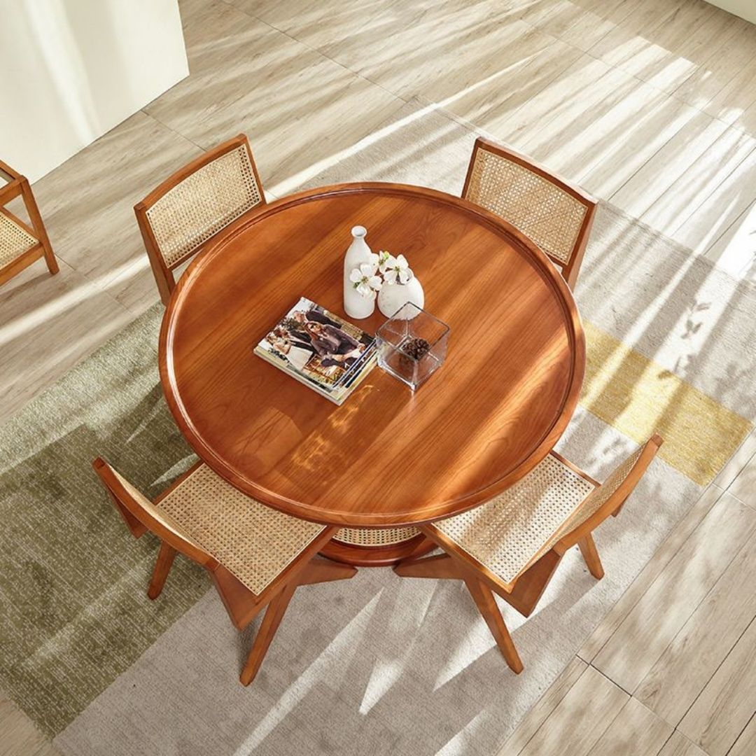 Modern dining table with handcrafted rattan and wooden chairs