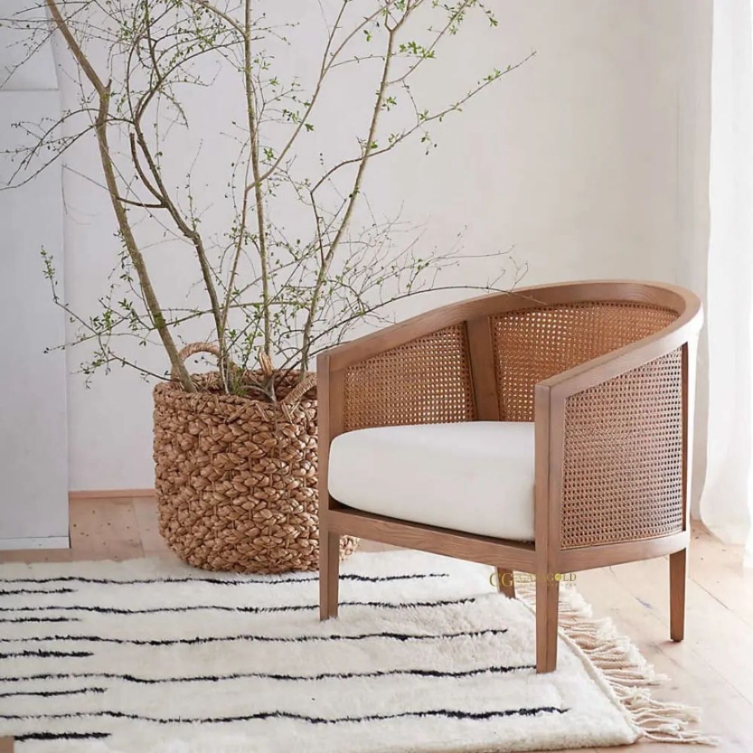 Rattan sofa chair with wooden frame and ivory cushion