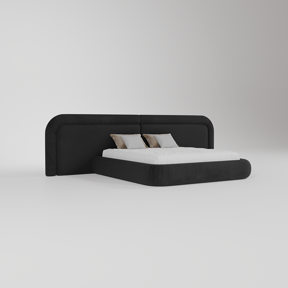 A modern low-profile platform bed with a tall, rounded headboard upholstered in black fabric, shown with white bedding and two neutral accent pillows against a light gray studio background.