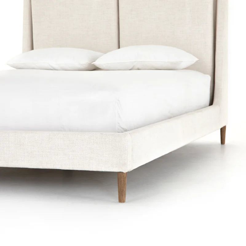  King wings bed with tufted headboard detail
