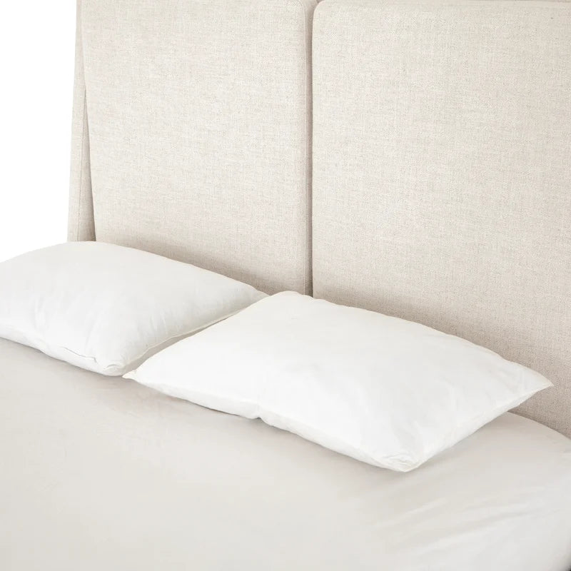 Minimalist wings bed with plush, soft headboard