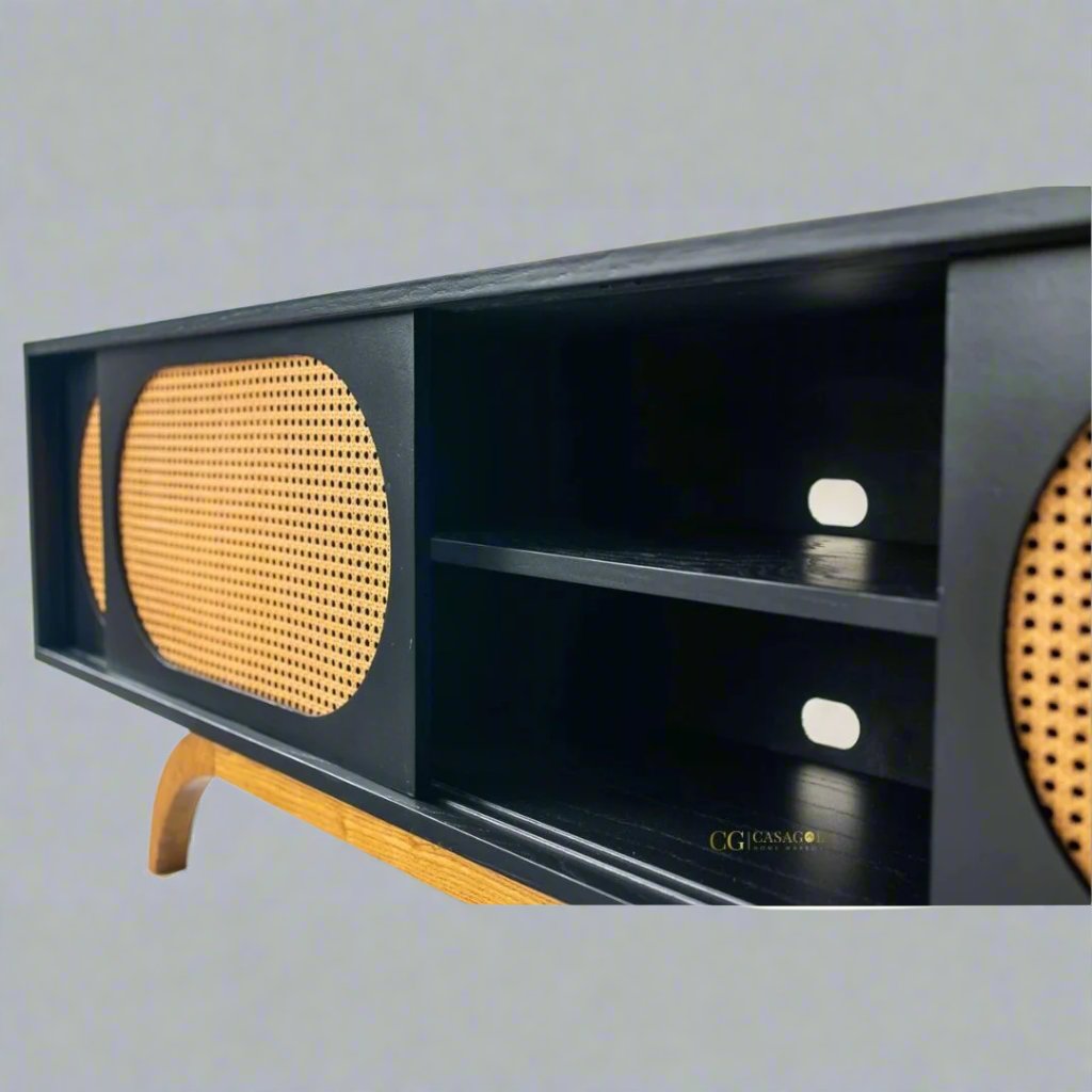 Handcrafted modern rattan and rubberwood media console with black finish and natural woven cabinet doors