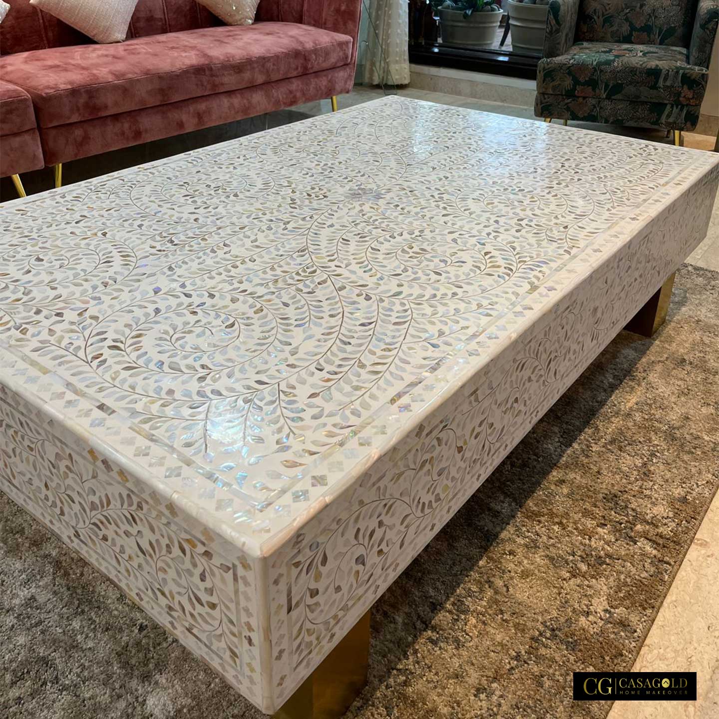 "Rectangular coffee table with intricate Cleo MOP inlay design"