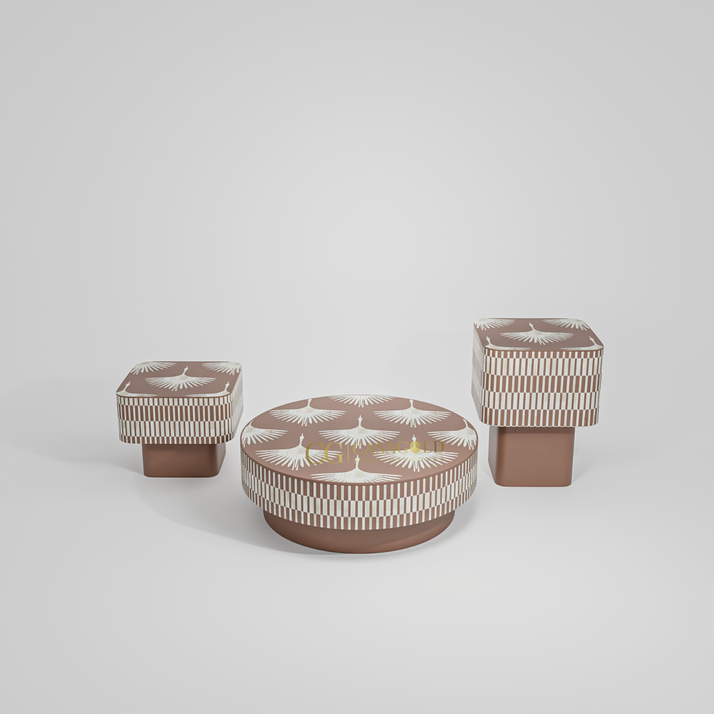 A set of three modern beige and white upholstered ottomans or tables. The largest piece is a circular coffee table with a pattern of fanned wings,