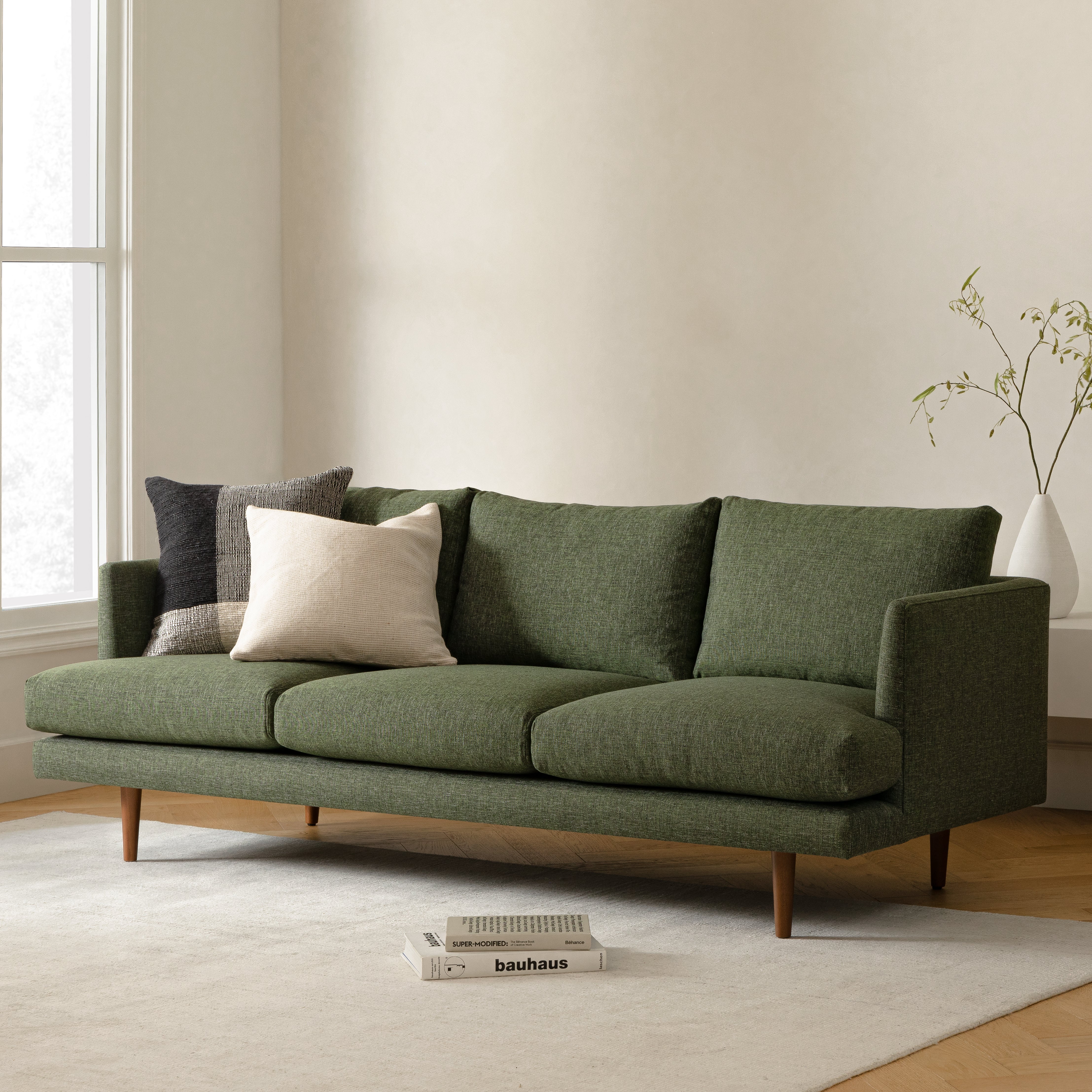 Vintage-Inspired Modern Sofa – Green Upholstery with Tapered Wooden Legs