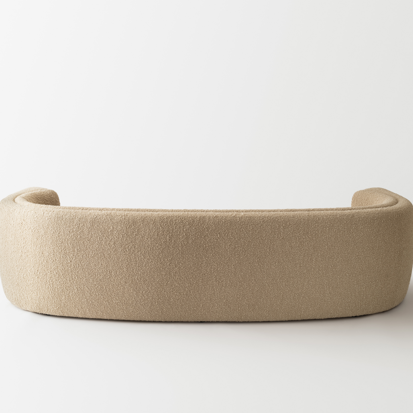 Contemporary Beige Bouclé Sofa – Minimalist Curved Design for Modern Living Rooms