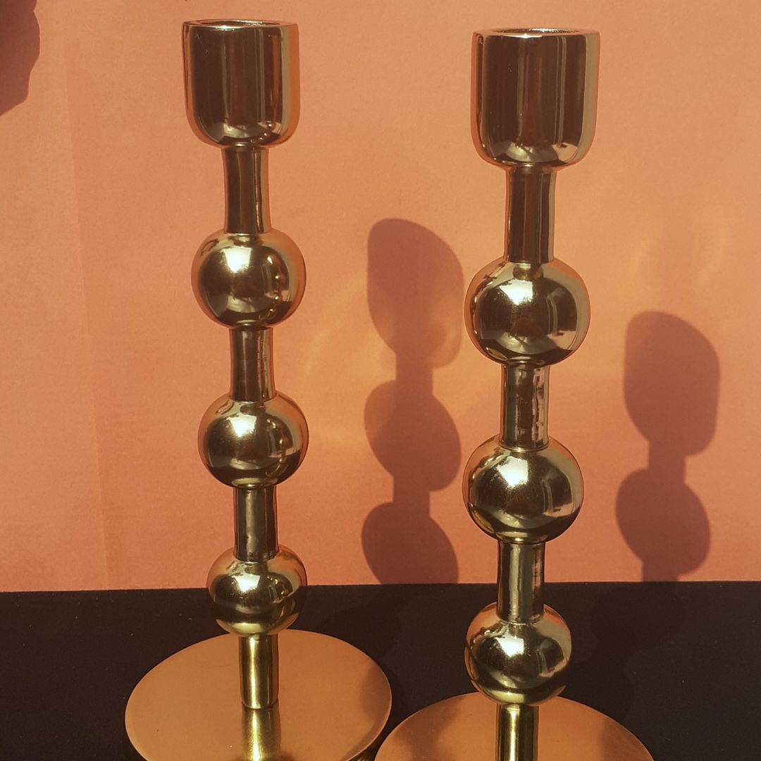 Antique brass holder for old-world charm
