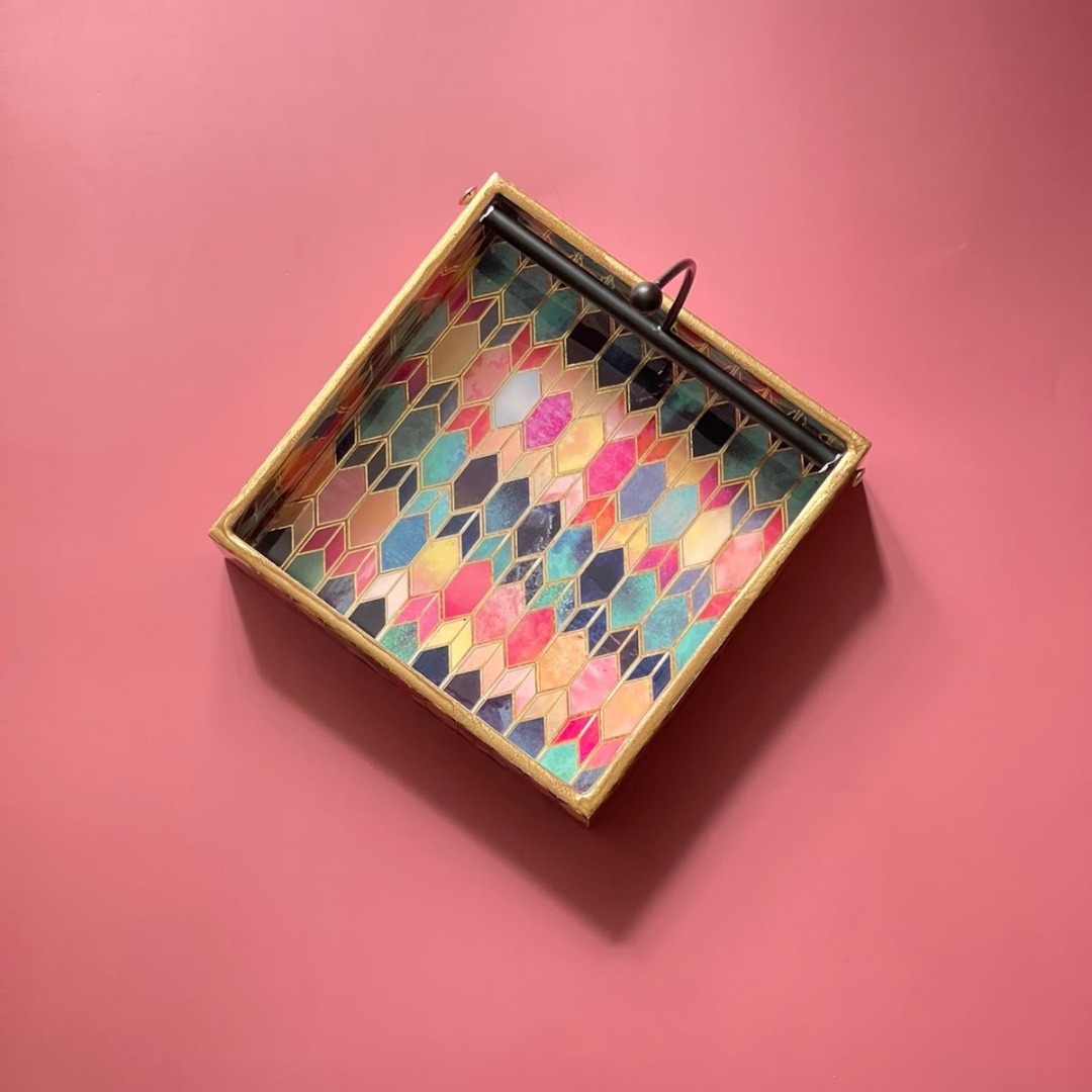 Artistic tissue tray with colorful, unique designs
