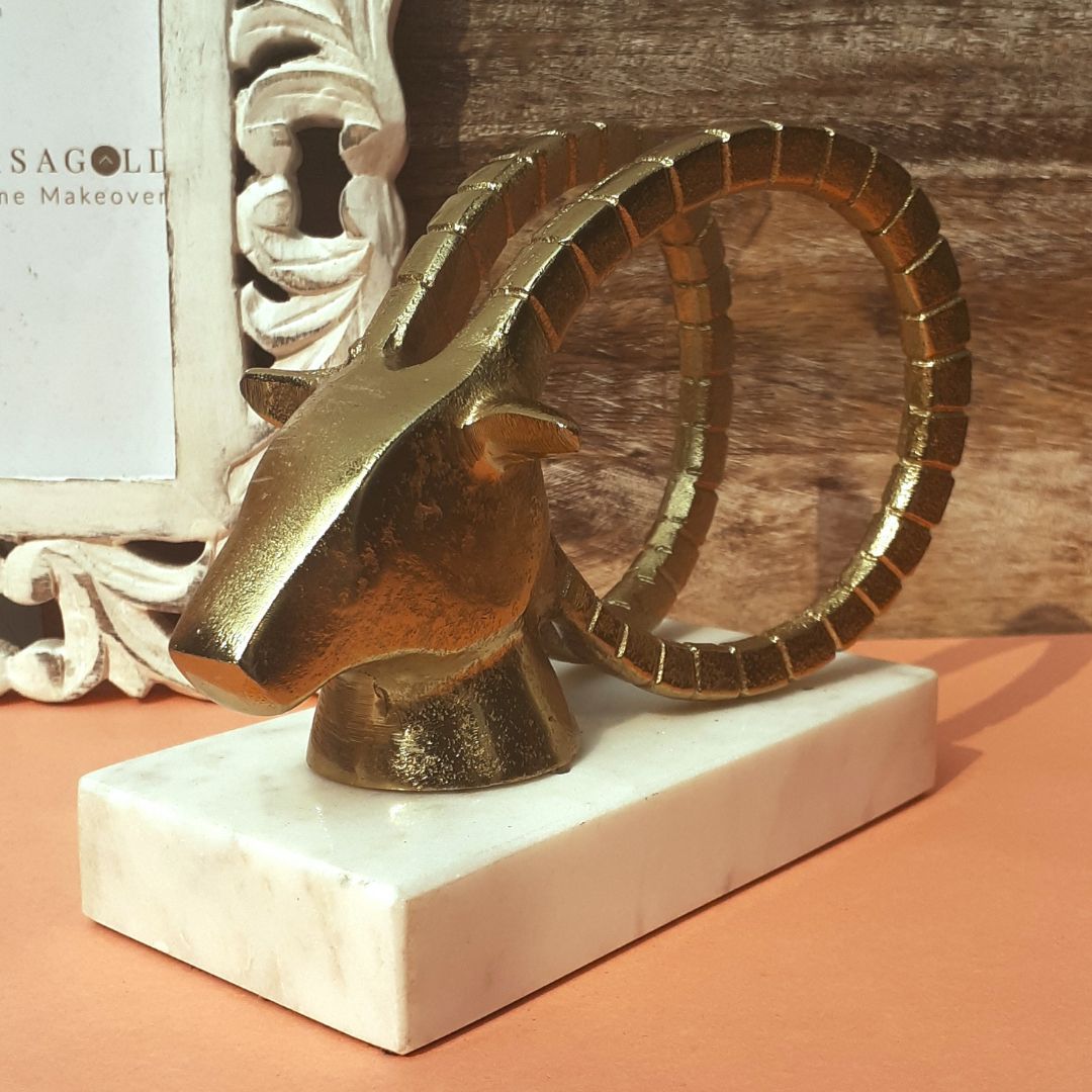 Brass ibex figurine with vintage charm