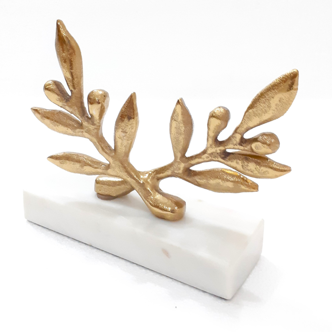 Decorative brass leaf with intricate engravings