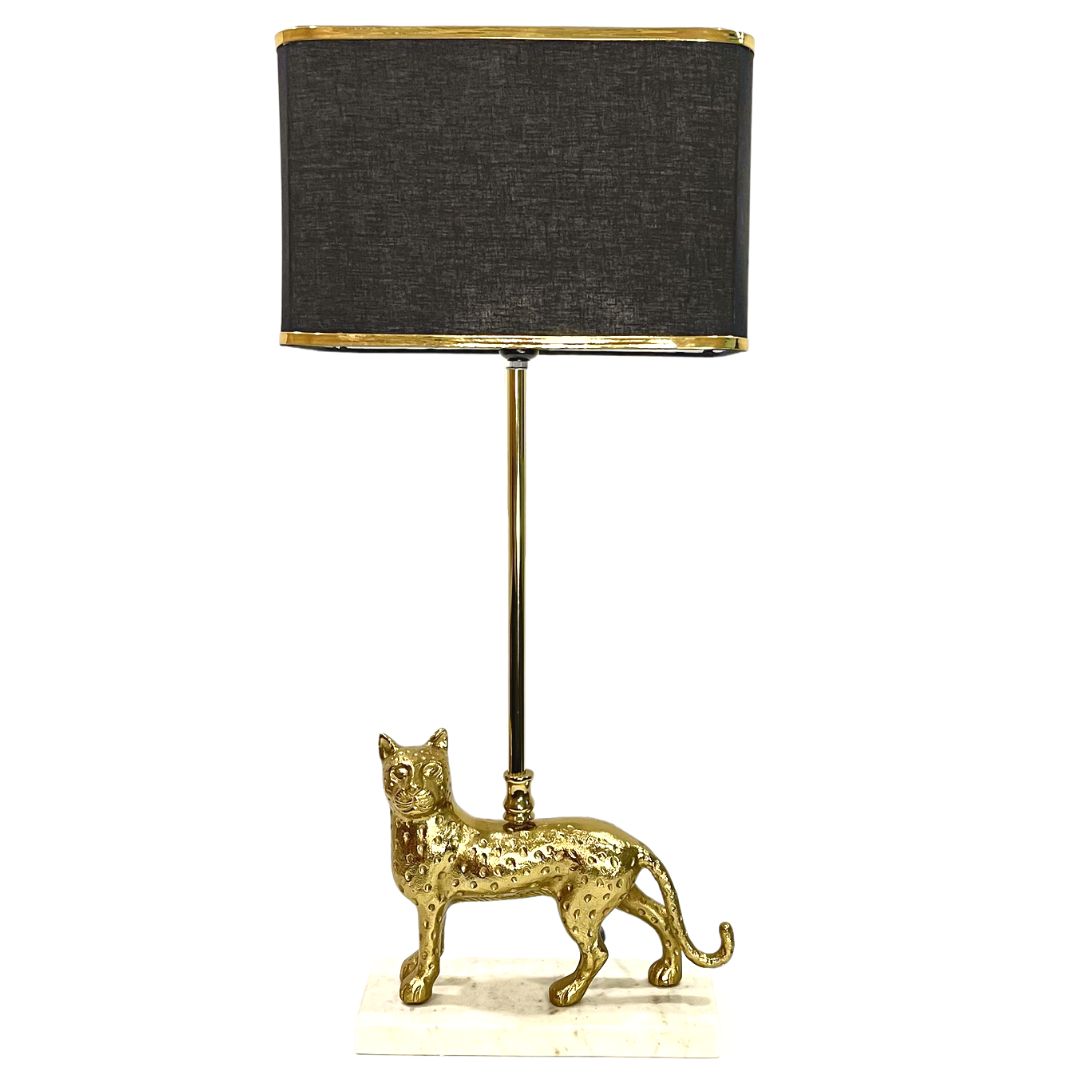 Gold luxury table lamp on a marble Base 
