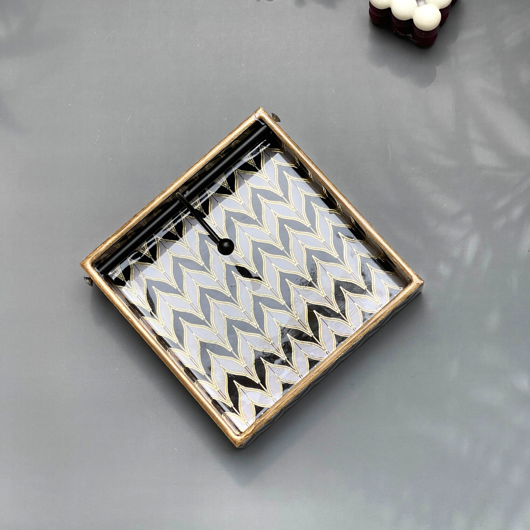 Handcrafted resin tissue tray for upscale interiors

