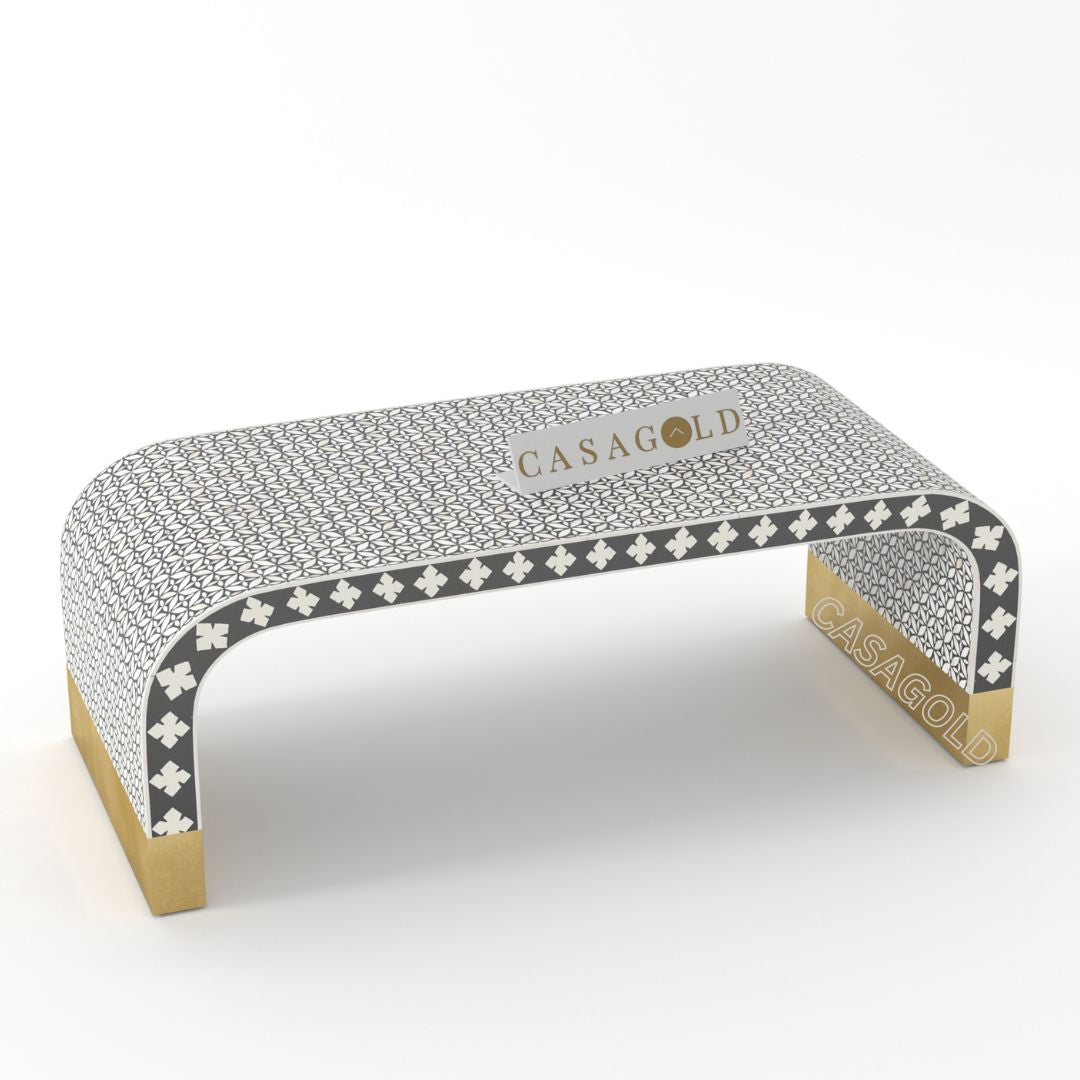 "Handcrafted black rectangular coffee table featuring intricate bone inlay"
