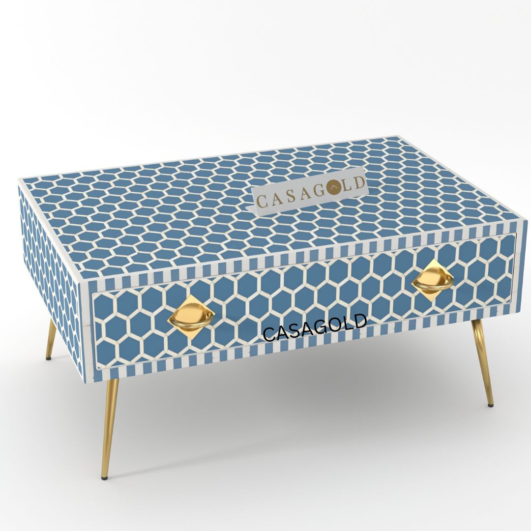 "Teal and white rectangular coffee table with bold bone inlay"
