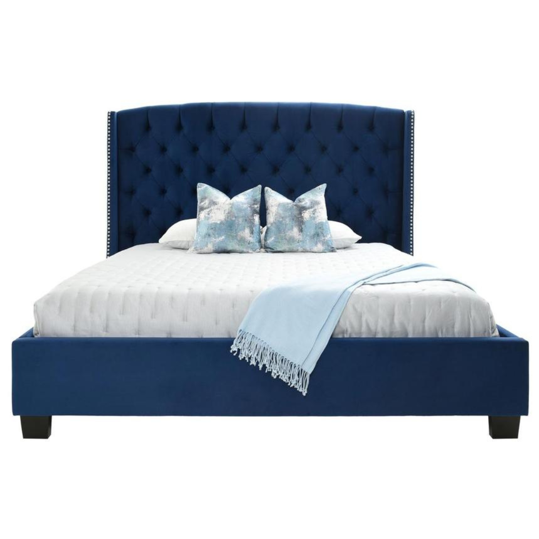 King wings bed with tufted headboard detail