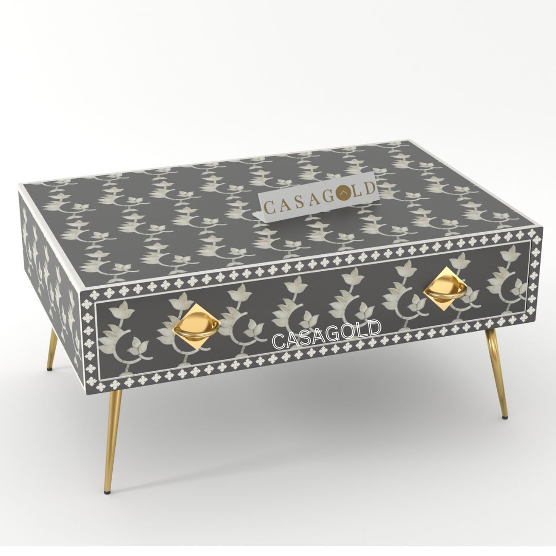 "Black and white rectangular coffee table with bold bone inlay"
