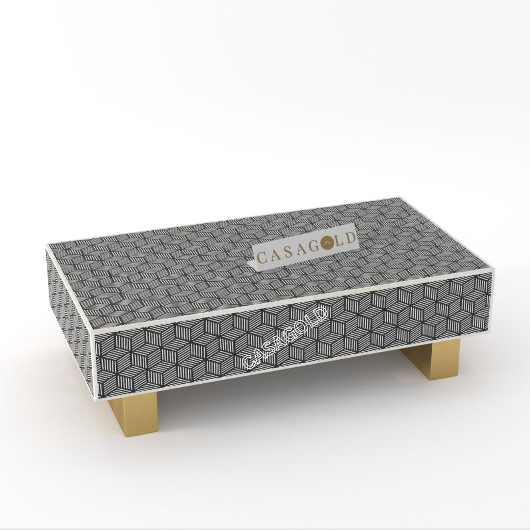 "Rectangular coffee table with bold patterned bone inlay designs"
