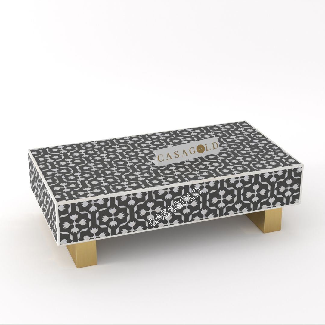 "Rectangular coffee table with intricate handcrafted bone inlay"
