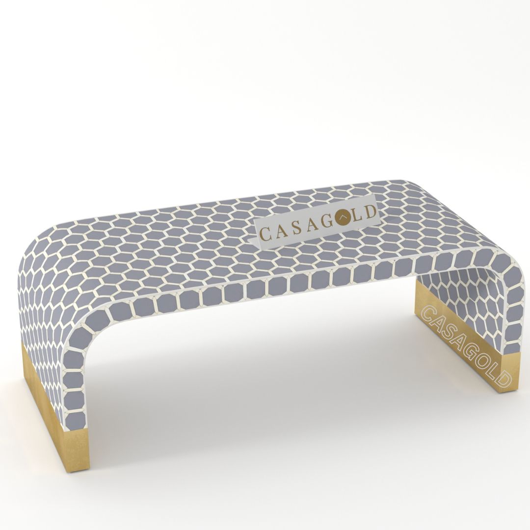 "Rectangular coffee table with bold patterned bone inlay designs"

