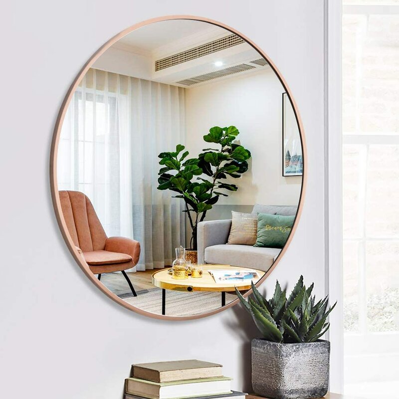 Round RoseGold finish steel frame glass mirror for warm decor tones