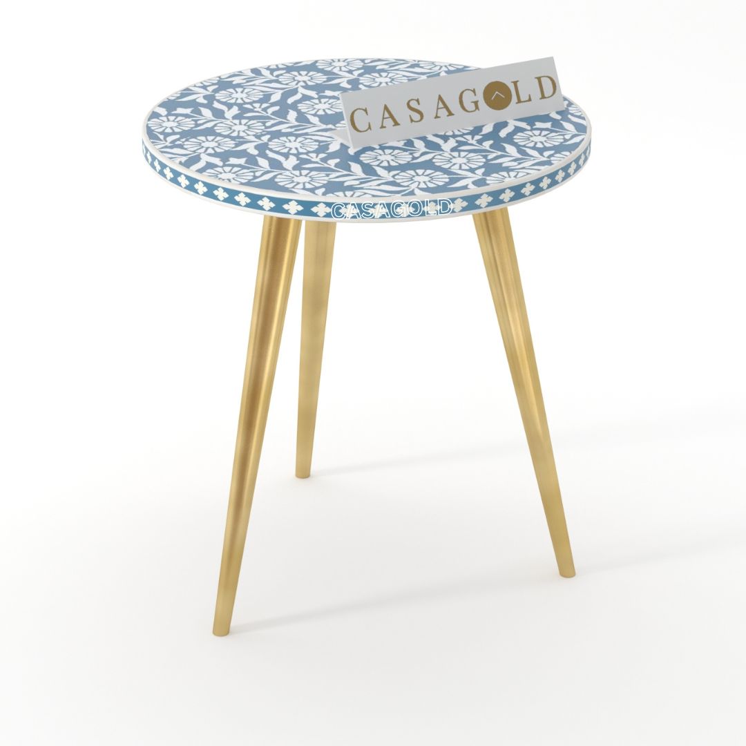 "Rustic round side table with bone inlay detailing and 3-leg support"
