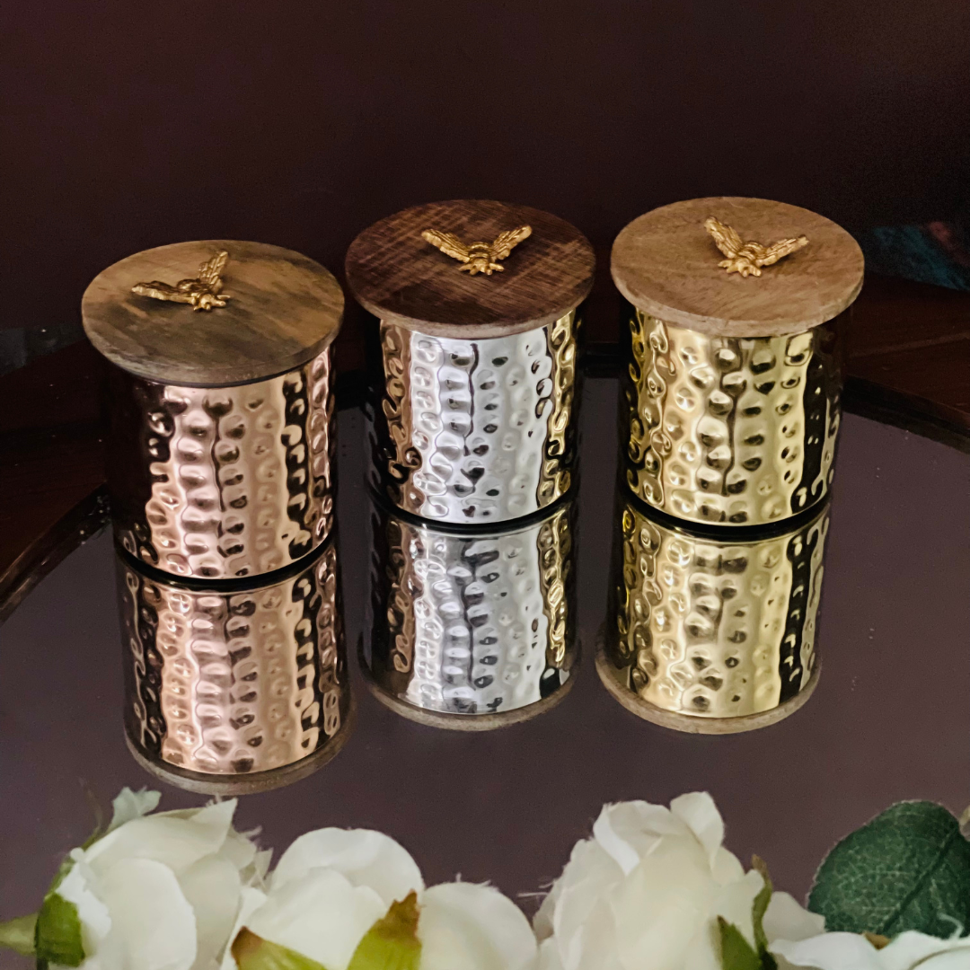 Rustic wax candle with textured exterior
