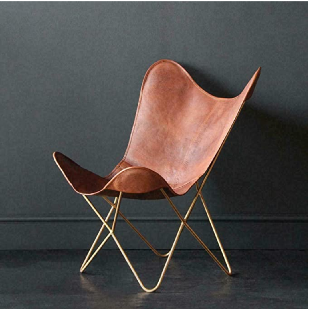 Timeless vintage brown leather lounge chair for cozy spaces
